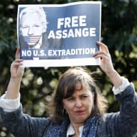Spanish MEP Ana Miranda protests Monday outside Belmarsh Prison in London where Julian Assange is being held.  | AP