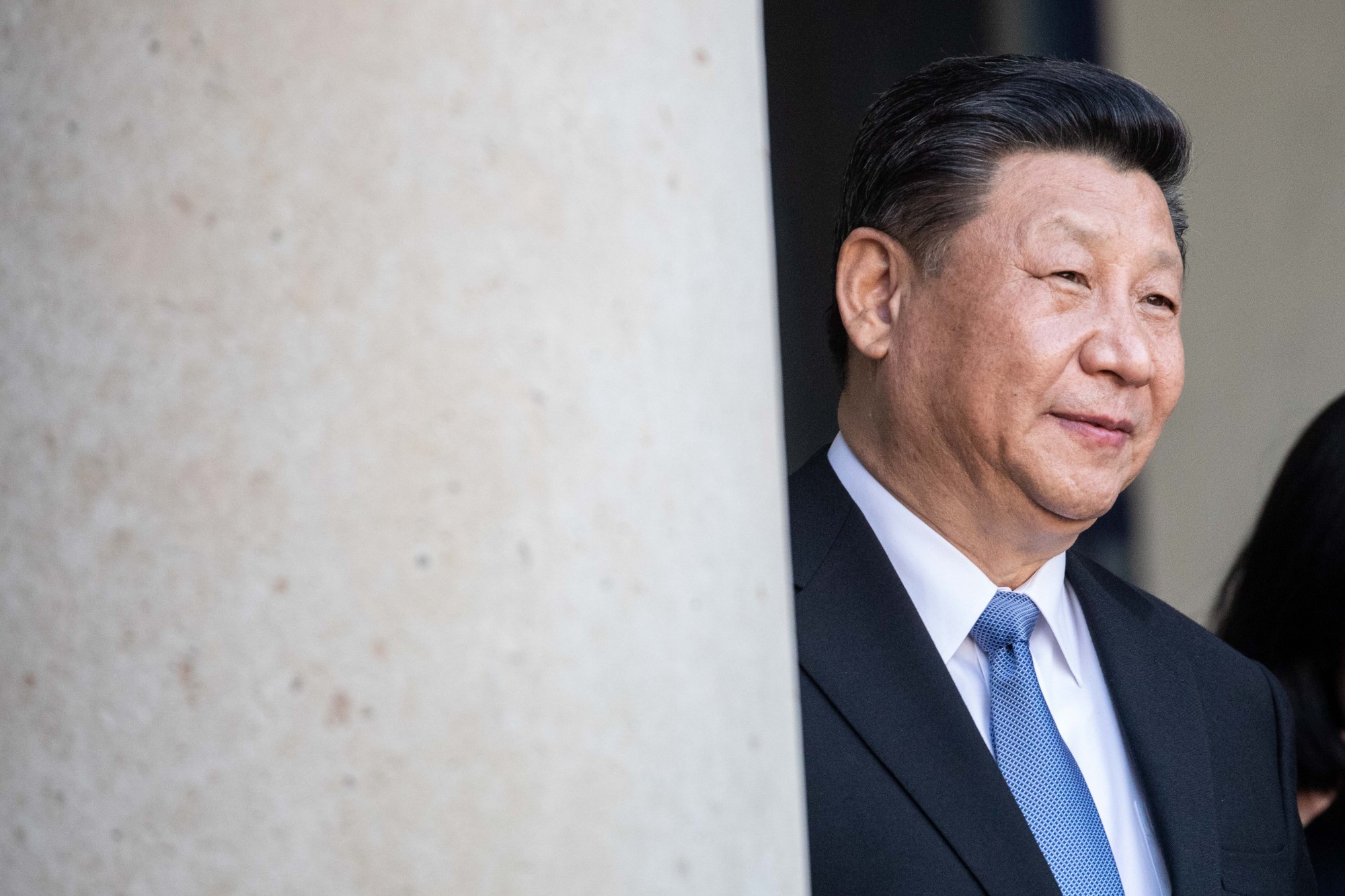 Chinese President Xi Jinping departs from the courtyard of the Elysee Palace in Paris on March 26 during a state visit to the French capital. | BLOOMBERG