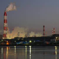 Japan\'s greenhouse gas emissions fell 1.2 percent in fiscal 2017, according to the Environment Ministry. | BLOOMBERG