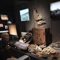 Artifacts from the 1945 atomic bombing of Hiroshima are shown to the media at the renovated Hiroshima Peace Memorial Museum on Wednesday, ahead of its public opening Thursday. | KYODO