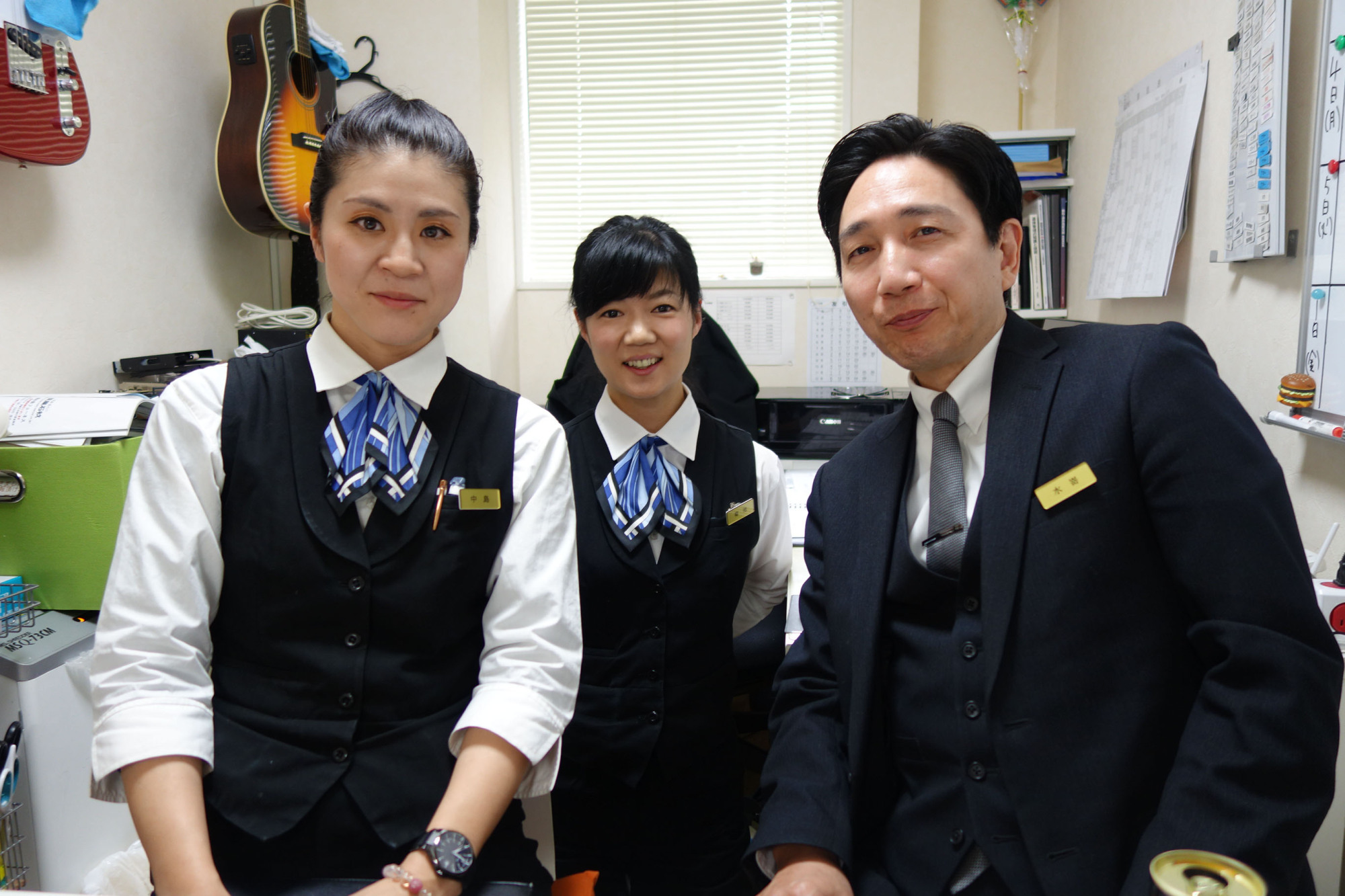 Yuko Nakajima (left), Mana Kikuchi (center) and Katsuji Mizusaki are nōkanshi, a term that refers to Japan's traditional morticians who dress and clean up the deceased. They work at Aqua Quality Staff Co., a Tokyo-based company Mizusaki founded a decade ago. | ALEX MARTIN