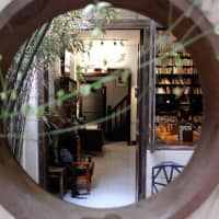 Find tranquility in the heart of a metropolis: Peeking into Ban She, a cafe occupying a restored lane house off Nanchang Road in Shanghai. | MATTHEW WALSH