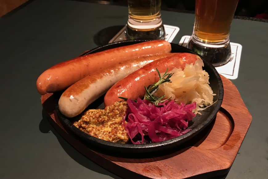 New location, better wurst: Schmatz has over half a dozen sausages on its menu, alongside classic German bar foods and locally brewed craft beer.