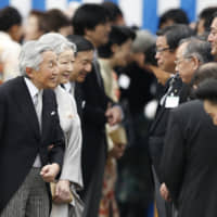 Common ground: Emperor Akihito and Empress Michiko have met with members of the general public and talked to them on their level. | AP