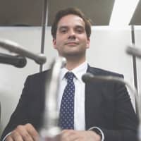 Mark Karpeles, former CEO of  Mt. Gox, attends a news conference in Tokyo in July 2017. | AFP-JIJI