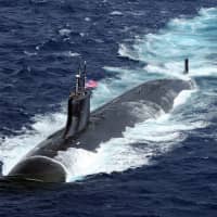 How the U.S. can ensure the security of undersea cables that carry more than 95 percent of intercontinental data and voice traffic is a question Washington is trying to answer. | U.S. NAVY