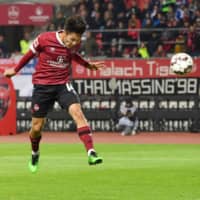 Nuremberg\'s Yuya Kubo scores on a header in the 82nd minute against Schalke on Friday in Nuremberg, Germany. | KYODO
