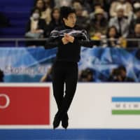 Nathan Chen competes in the free skate at the World Team Trophy on Friday in Fukuoka. Chen finished first in the two-day men\'s competition with 301.44 points. | AP