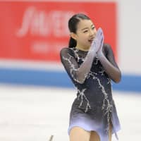 Rika Kihira reacts after her performance in the women\'s free skate on Saturday. Kihira placed fourth overall. | AFP-JIJI