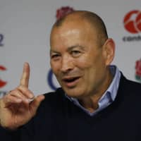 England rugby coach Eddie Jones, seen in a March 2017 file photo, says the Sunwolves have served a valuable purpose in giving \"opportunities for young Japanese players to prepare for test rugby.\" The franchise is leaving Super Rugby after the 2020 season. | REUTERS