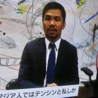 Manny Pacquiao, who has signed a promotional contract with Rizin, speaks via a video message to Japanese fans on Tuesday. | KAZ NAGATSUKA