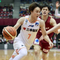 Albirex guard Kei Igarashi drives against the Brave Thunders during a B. League contest in January at Todoroki Arena in Kawasaki. | KAZ NAGATSUKA