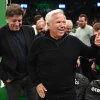 New England Patriots owner Robert Kraft gestures Sunday during a timeout in a game between the Boston Celtics and Indiana Pacers in game one of the first round of the 2019 NBA Playoffs at TD Garden. | BOB DECHIARA-USA TODAY SPORTS / VIA REUTERS
