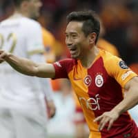 Galatasaray defender Yuto Nagatomo celebrates after scoring against Kayserispor on Saturday in Istanbul. | KYODO