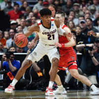 Gonzaga\'s Rui Hachimura (left) is defended by Texas Tech\'s Matt Mooney during the NCAA Tournament on March 30. | USA TODAY / VIA REUTERS