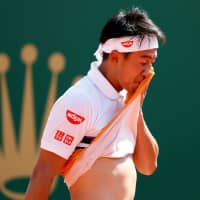 Kei Nishikori reacts during his match against Pierre Hugues Herbert at the Monte Carlo Masters on Wednesday in Monte Carlo. | REUTERS