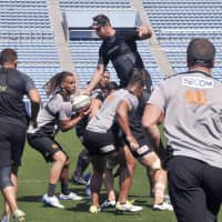 Sunwolves players, including captain Dan Pryor (second from left), practice on Thursday, a day before their Super Rugby match against the Hurricanes in Tokyo. | KYODO