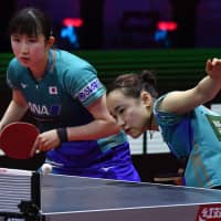 Mima Ito (right) and Hina Hayata compete against fellow countrywomen Hitomi Sato andHonoka Hashimoto (not pictured) on Saturday during the women\'s double semifinal at the ITTF World Table Tennis Championships 2019 in Budapest. | AFP-JIJI