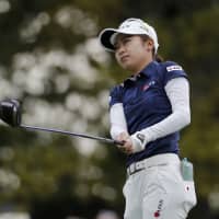 Yuka Yasuda tees off the first hole during the final round of the Augusta National Women\'s Amateur golf tournament in Augusta, Georgia, on Saturday. | AP