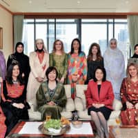 The Society of Wives of Arab Ambassadors in Japan (SWAAJ) hosted a friendly luncheon in honor of Akie Abe (front row, second from left), wife of Prime Minister Shinzo Abe, and Kaori Kono (front row, second from right), wife of Foreign Minister Taro Kono. Abe and Kono were joined by the wife of the Palestinian ambassador and SWAAJ President Maali Siam (front row, left); wife of the Lebanese ambassador and luncheon host Nancy Nameh (front row, right); and other SWAAJ members at the Lebanese ambassador\'s residence on March 18. | MIKI OSHITA