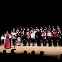 On April 13, a choir of 11 ambassadors to Japan performed at Owada Sakura Hall with a children\'s choir in a concert titled \"Ueda Maki Works 1.\" The group sang four poems by Michio Mado which were translated into English by Empress Michiko and set to music by composer Maki Ueda. | COURTESY OF JUNKO KATANO