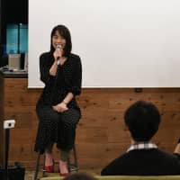 Kayo Tango shares her efforts with event moderator Minako Suematsu, chairperson of The Japan Times. | YOSHIAKI MIURA
