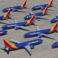 A number of grounded Southwest Airlines Boeing 737 Max 8 aircraft are shown parked at Victorville Airport in Victorville, California, March 26. | REUTERS