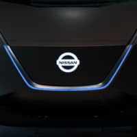 A Nissan Motor Co. IMx Kuro electric concept vehicle is displayed at the carmaker\'s headquarters in Yokohama last week. | BLOOMBERG
