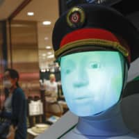 SEMMI, developed by German railway company Deutsche Bahn AG, is one of two AI robots that East Japan Railway Co. began using in a public trial on Wednesday. The robots are designed to guide passengers at Tokyo Station. | KYODO
