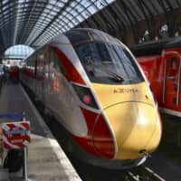 The Azuma high-speed train, manufactured by Japan\'s Hitachi Ltd., is shown to the media at London\'s King\'s Cross Station on Tuesday. The train was to begin commercial operations from Wednesday. | KYODO