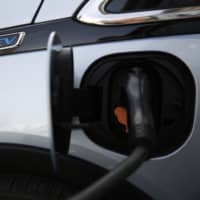 Drivers of electric vehicles, including the Chevrolet Bolt, are being hit with higher fees in 24 U.S. states. | BLOOMBERG