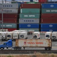 Unloaded containers from Asia stand at the main port terminal in Long Beach, California, on Friday. | AFP-JIJI