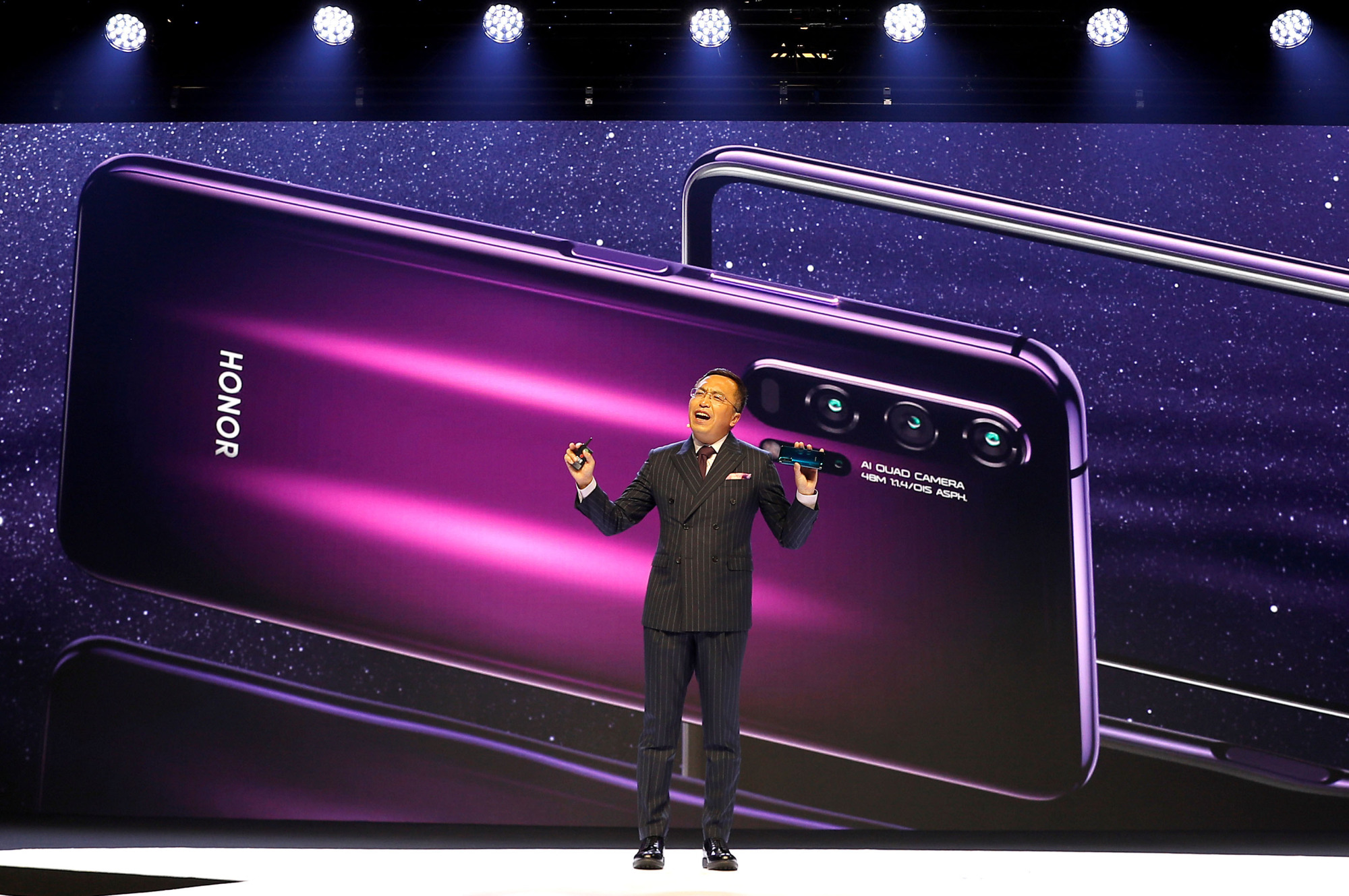 President of Huawei's Honor brand, George Zhao, launches the Honor 20 range of smartphones at an event in London on Tuesday. | REUTERS
