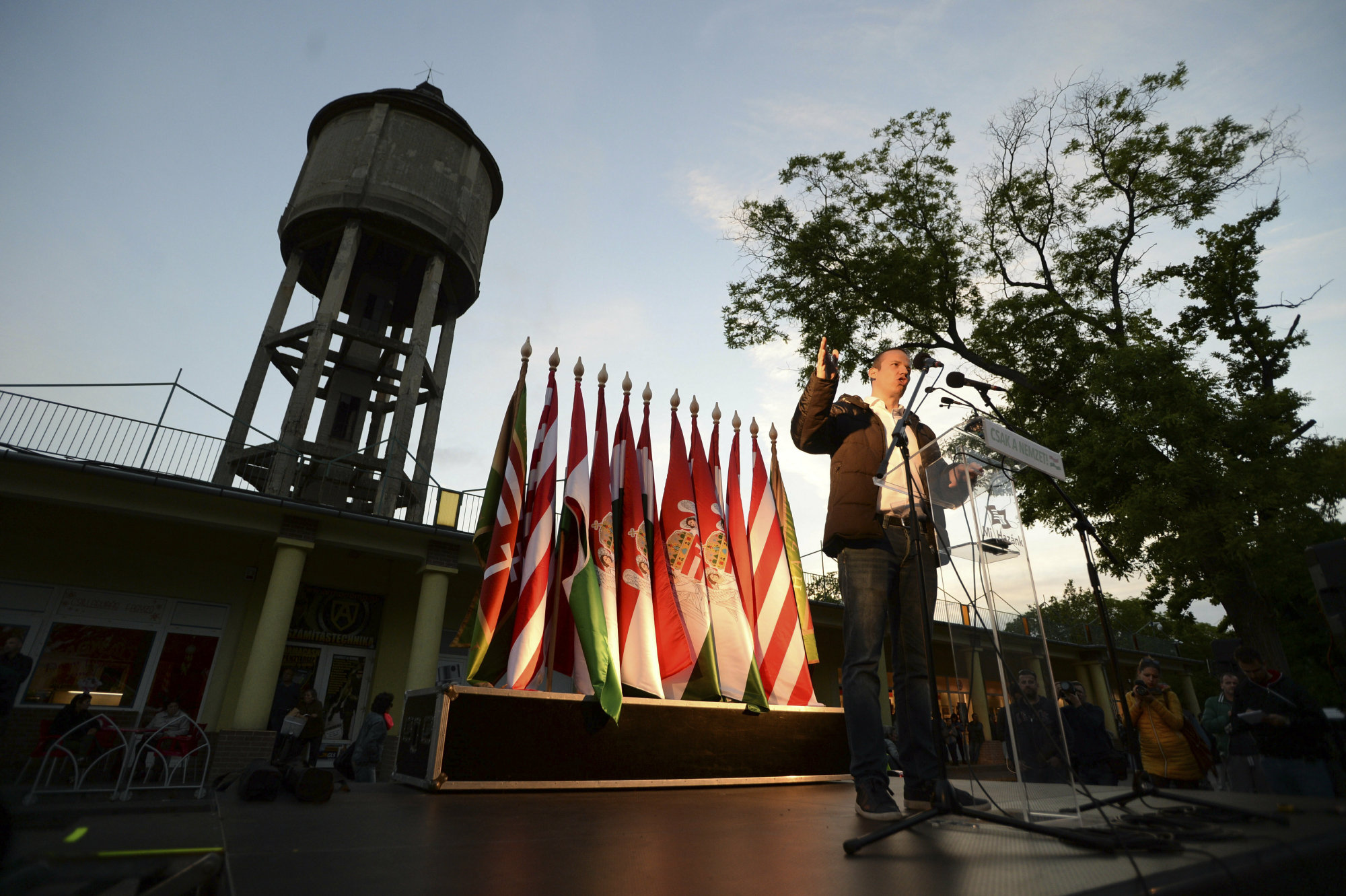 Laszlo Toroczkai, president of the Hungarian far-right party Mi Hazank Mozgalom (Our Homeland Movement), speaks during a demonstration in Torokszentmiklos, Hungary, Tuesday. The small far-right party held a rally in the rural Hungarian city, exploiting renewed tensions with some of the local Roma population | ZOLTAN BALOGH / MTI V/ IA AP
