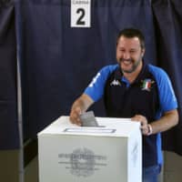 Italian Interior Minister and Deputy Premier Matteo Salvini, of the League, casts his ballot for the European Parliament elections, at a polling station in Milan, Italy, Sunday. Pivotal elections for the European Union parliament reach their climax Sunday as the last 21 nations go to the polls and results are announced in a vote that boils down to a continent-wide battle between euroskeptic populists and proponents of closer EU unity. | AP