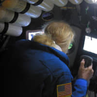 Undersea explorer Victor Vescovo pilots the submarine DSV Limiting Factor in the Pacific Ocean\'s Mariana Trench in an undated still image from video released by the Discovery Channel Monday. | ATLANTIC PRODUCTIONS FOR DISCOVERY CHANNEL / HANDOUT / VIA REUTERS