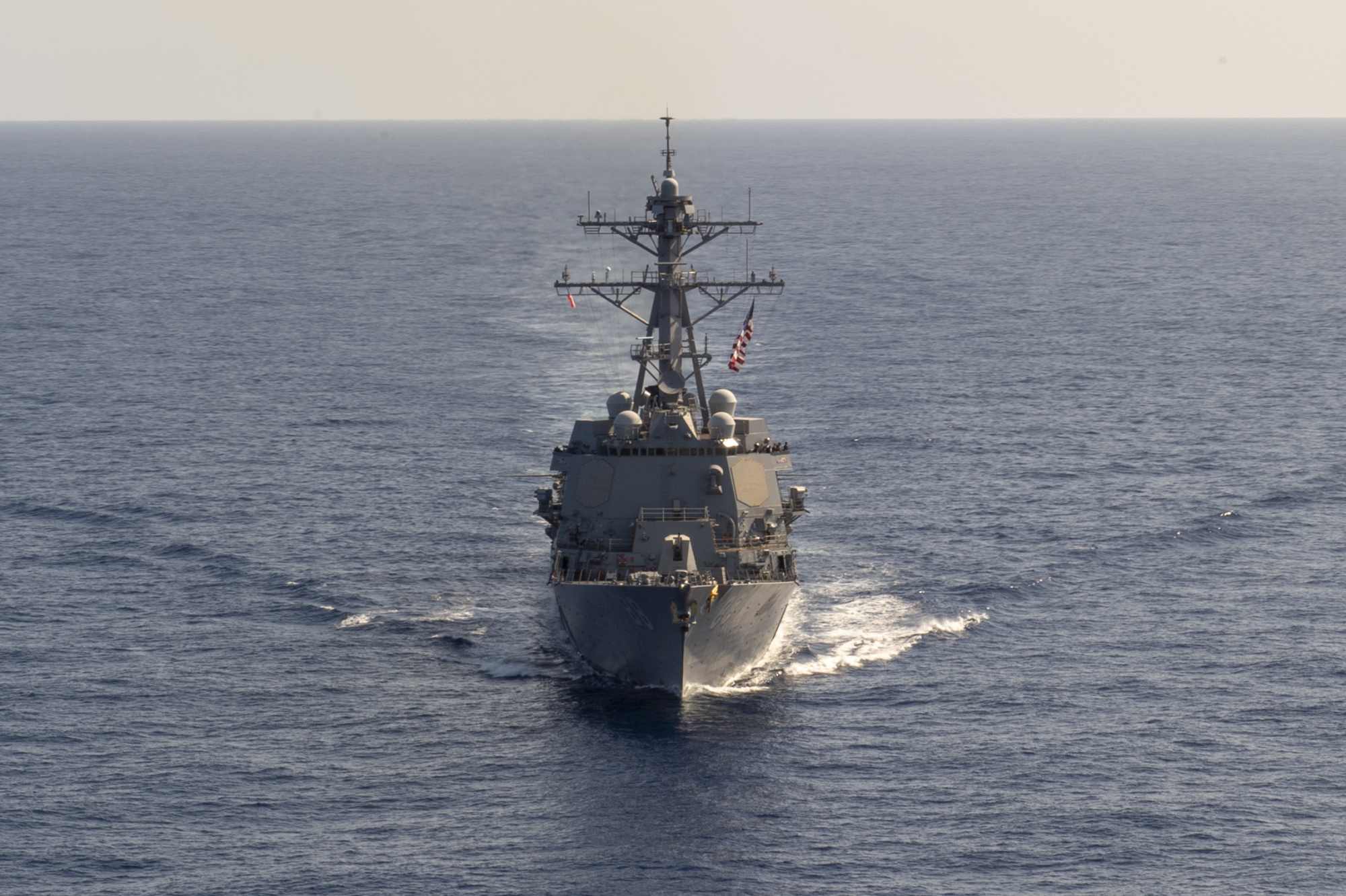 The guided-missile destroyer USS Preble steams through the Philippine Sea on April 18. | COMMANDER, TASK FORCE 70 / CARRIER STRIKE GROUP 5