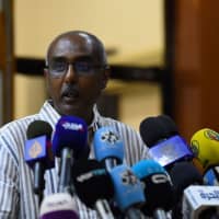 Rashid al-Sayed, a Sudanese protest leader, speaks to the press in Khartoum on Wednesday. Sudanese protest leaders threatened to launch a nationwide campaign of civil disobedience after accusing the country\'s military rulers of delaying the transfer of power to a civilian administration. | AFP-JIJI
