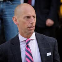 Marc Mukasey, a lawyer for U.S. President Donald Trump, exits the Manhattan Federal Courthouse, following a ruling by a judge to allow Deutsche Bank AG and Capital One Financial Corp. to provide financial records to investigators, in New York City May 22. | REUTERS