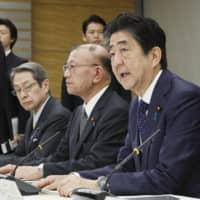 Prime Minister Shinzo Abe speaks during a meeting at the Prime Minister\'s Office in Tokyo on Tuesday. He called on relevant officials to enhance safety measures on roads used by young children to go to and from their schools and kindergartens. | KYODO