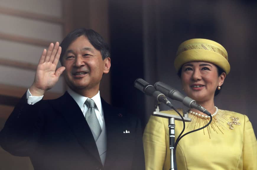 Emperor Naruhito and Empress Masako greet well-wishers during their first public appearance in their new roles at the Imperial Palace in Tokyo on Saturday.