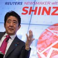 Prime Minister Shinzo Abe speaks during an event in New York in September 2016. | REUTERS