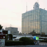 NHK\'s head office stands in Tokyo\'s Shibuya Ward. A court ruled Wednesday that the owner of a car with a navigation system capable of receiving television signals should pay the monthly subscription fee for Japan\'s public broadcaster. | KYODO