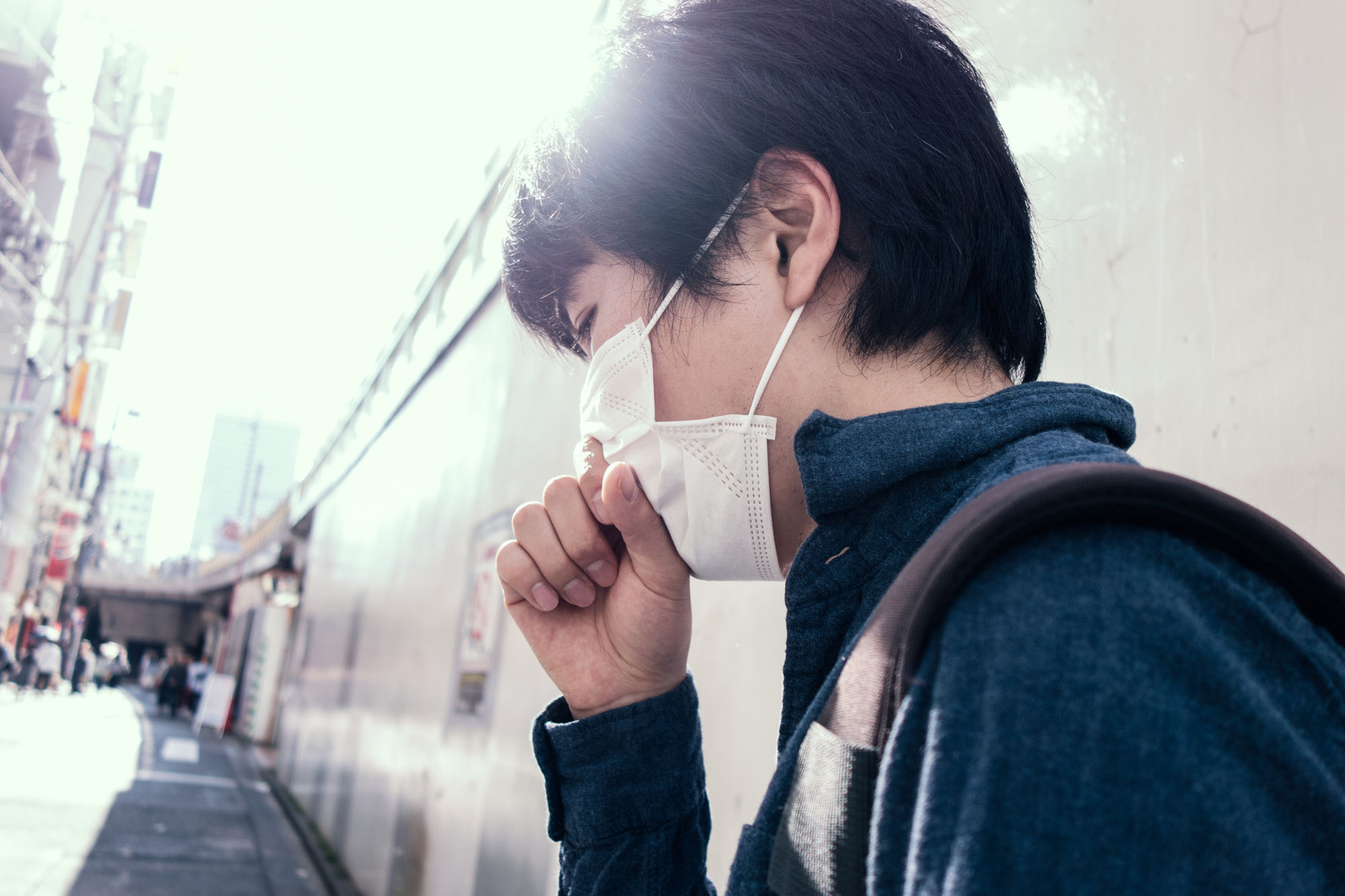 Scholars say that, after the Spanish flu pandemic subsided in Japan in the early 20th century, preventive measures, including the use of the face masks, became widespread. | GETTY IMAGES