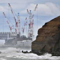 The Fukushima No. 1 nuclear power plant is seen on March 11 in Futaba, Fukushima Prefecture. The complex was struck by the 2011 earthquake-tsunami disaster and is currently being decommissioned. | KYODO