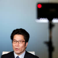Takuya Yokota, a younger brother of abductee Megumi Yokota, speaks during an interview in Tokyo on Tuesday. | REUTERS