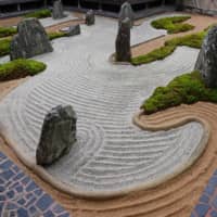 Tile, colored gravel and cement are part of the Mirei Shigemori garden at Fukuchiin in Mount Koya, Wakayama Prefecture. | STEPHEN MANSFIELD
