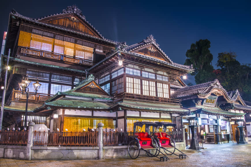 Lights, camera, relaxation: The 1,000-year-old Dogo Onsen in Matsuyama was inspiration for the bath houses in 'Spirited Away.' | GETTY IMAGES