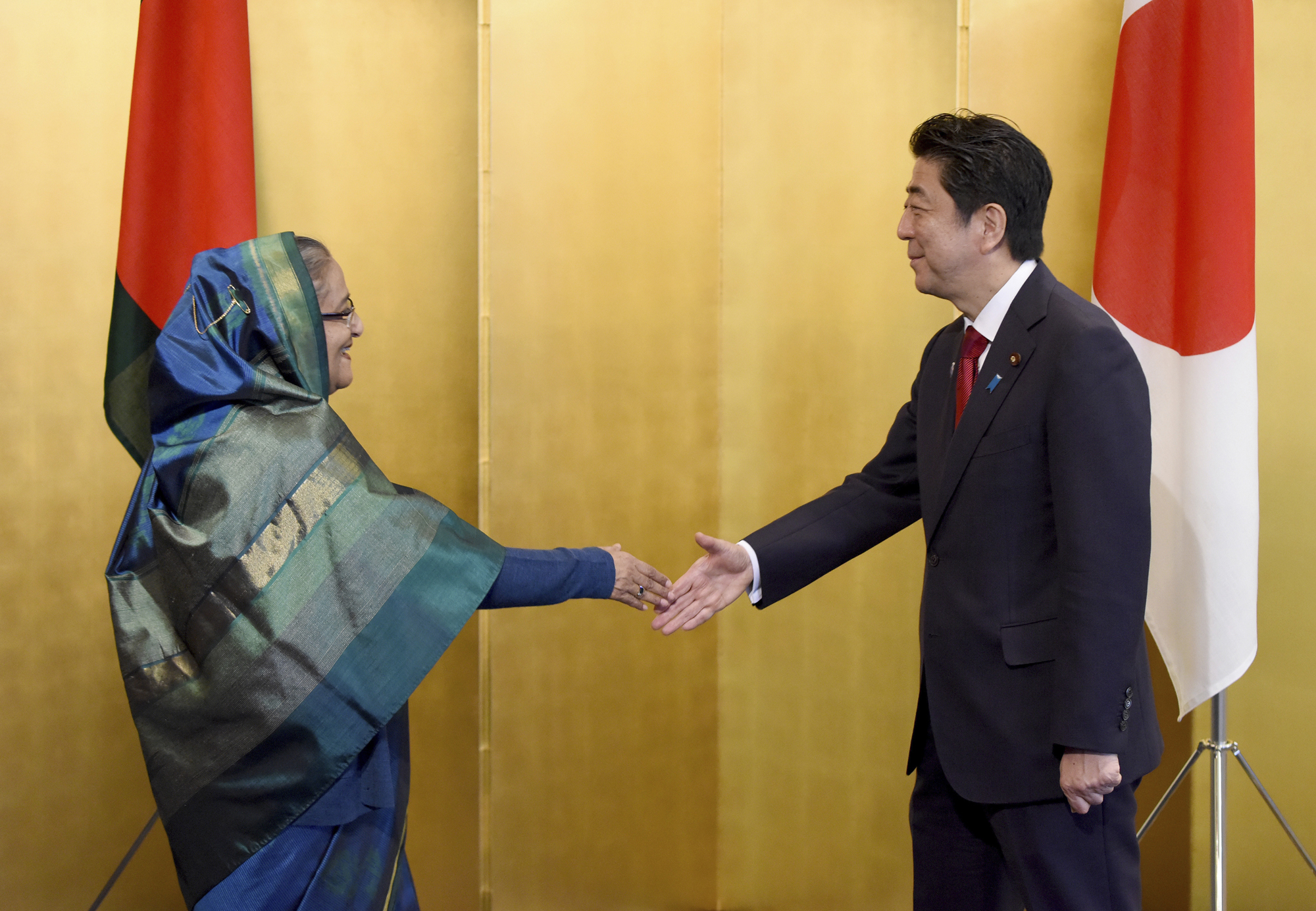 Prime Minister Shinzo Abe welcomes Bangladesh Prime Minister Sheikh Hasina before holding talks on May 28, 2016. The two leaders will meet again this week in Tokyo. | AP