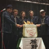 Getting the party started: (From left) Masashi Togami breaks open a ceremonial sake cask with Phoenix band members Thomas Mars, Deck d\'Arcy, Christian Mazzalai and Laurent Brancowitz. | MELINDA JOE
